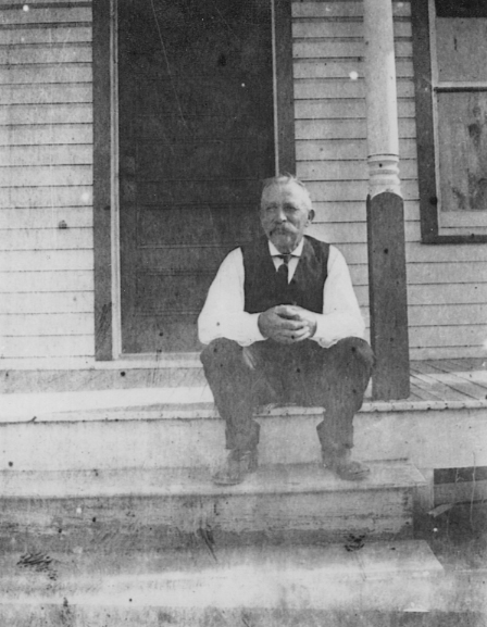 Johanna's father Anton Manelski on porch step